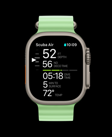 Apple Watch Ultra 3 com caixa em titânio natural, Bracelete Ocean verde‑néon e as seguintes métricas de mergulho Oceanic+: profundidade, tempo de descompressão, tempo de mergulho, minutos para chegar à superfície, temperatura da água