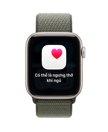 Apple Watch SE 3, vỏ nhôm, màu ánh sao, thông báo nghi bị ngưng thở khi ngủ, biểu tượng trái tim màu hồng trong khung trắng, mặt ngoài bên phải, Digital Crown, Dây Đeo Thể Thao, màu tím sương khói